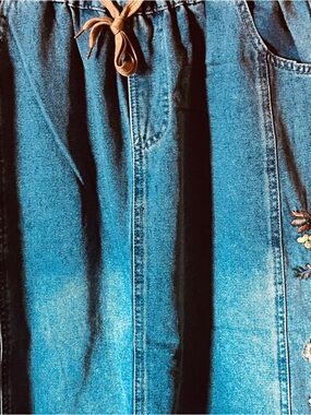 Blue Denim Drawstring Skirt with Embroidered Floral Accent